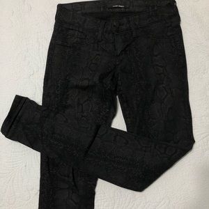 Snake skin skinny jeans